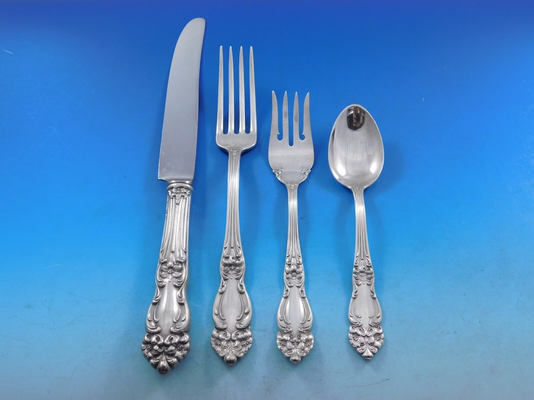 Reed & Barton Amaryllis Sterling Silver 4-Piece Place Setting: Reed & Barton Amaryllis Sterling Silver 4-Piece Place Setting This exquisite 4-piece dinner size place setting features the elegant Amaryllis pattern by Reed & Barton, crafted from high-quality sterli