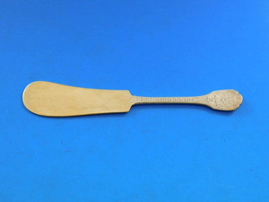 Soubise Vermeil Puiforcat Sterling Silver Butter Spreader 5 1/8": Soubise Vermeil Puiforcat Sterling Silver Butter Spreader 5 1/8" Elevate your dining experience with this exquisite Butter Spreader from the Soubise Vermeil pattern by Puiforcat. Crafted from high-qua