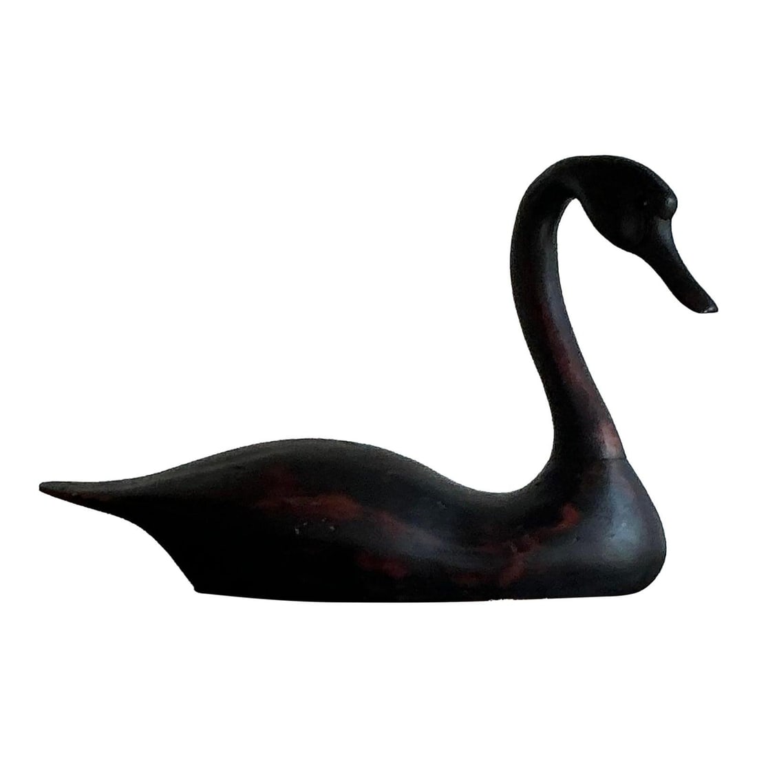 Vintage Life Size Hand-Carved Black Swan Sculpture: Vintage Life Size Hand-Carved Black Swan Sculpture Embrace the tranquil beauty of nature with this exquisite life-size swan decoy. Hand-carved from solid wood, it features a deep ebonized finish that