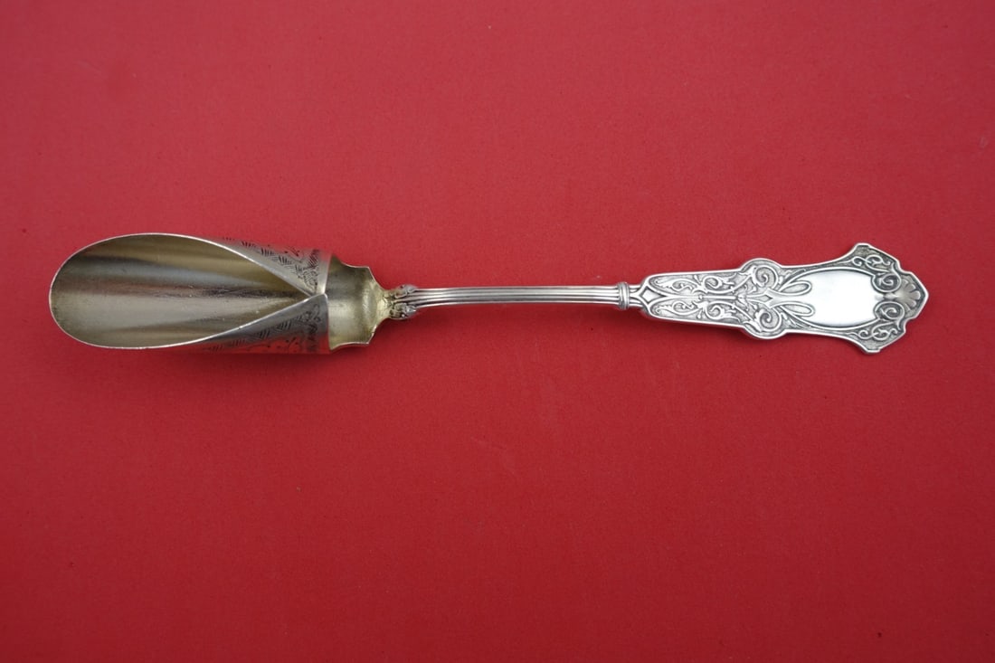 Whiting Alhambra Sterling Silver Cheese Scoop 8 1/4" Original Stippled: Whiting Alhambra Sterling Silver Cheese Scoop 8 1/4" Original Stippled Explore the elegance of the Alhambra pattern by Whiting with this exquisite sterling silver cheese scoop. This original piece, me