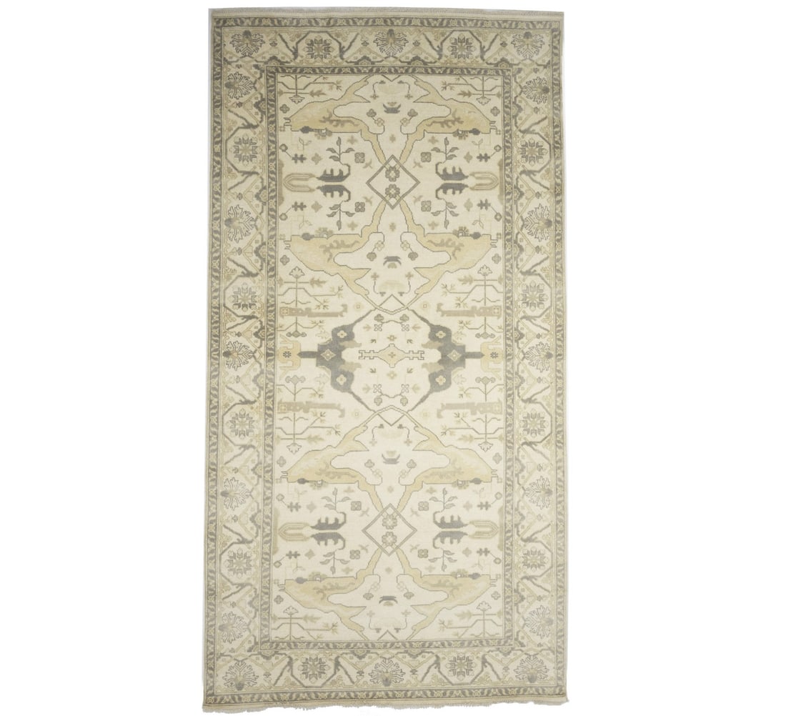 Handmade Oushak 8'3 x 15'11 Floral Wool Area Rug: Handmade Oushak 8'3 x 15'11 Floral Wool Area Rug Enhance your living space with this exquisite Handmade 8'3" x 15'11" Oushak Oriental Rug, featuring a muted floral design that effortlessly complements