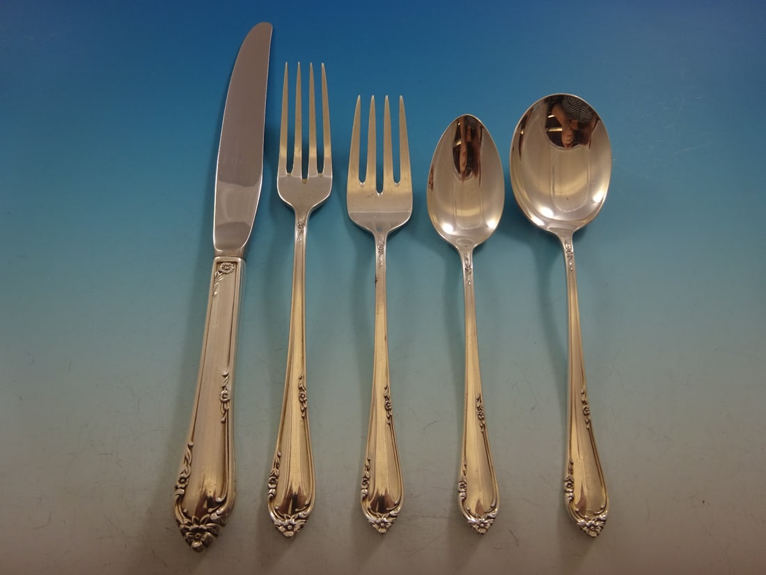 Reed & Barton Dancing Flowers Sterling Silver Flatware Set 63 Pcs Service for 12: Reed & Barton Dancing Flowers Sterling Silver Flatware Set 63 Pcs Service for 12 Enhance your dining experience with the exquisite Dancing Flowers Sterling Silver Flatware Set by Reed & Barton. This p