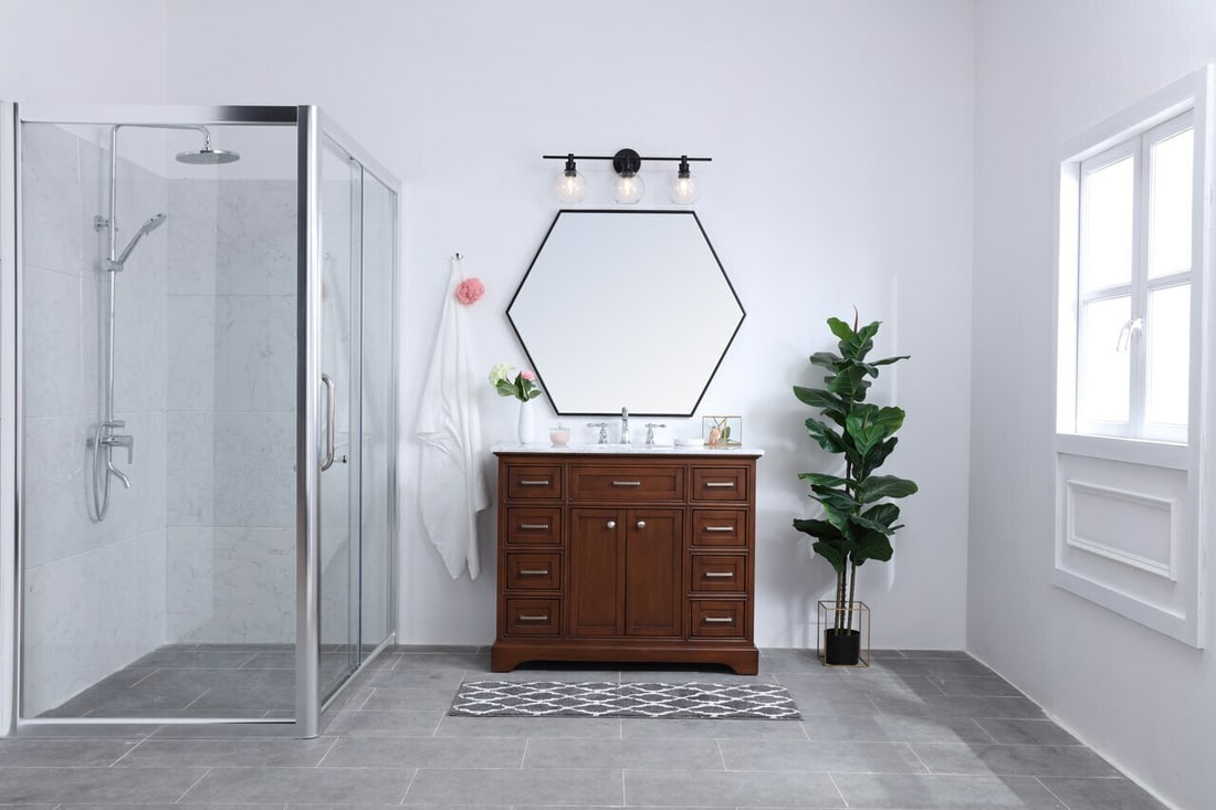 Collier Modern Black Wall Sconce with Three Clear Glass Shades 28 Inch: Collier Modern Black Wall Sconce with Three Clear Glass Shades 28 Inch This modern wall sconce features three lights set in a black metal frame with clear glass round shades, offering a stylish lighti