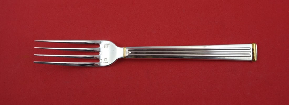 Christofle Triade Gold Accent Silverplate Dessert Fork 6.75": Christofle Triade Gold Accent Silverplate Dessert Fork 6.75" This exquisite dessert fork features the elegant Triade Gold Accent pattern by Christofle. Crafted from high-quality silverplate, it measur
