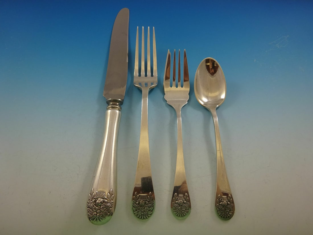 Tuttle Sterling Silver 4-Piece Basket of Flowers Place Setting: Tuttle Sterling Silver 4-Piece Basket of Flowers Place Setting This exquisite 4-piece place setting features the elegant 'Basket of Flowers' pattern by Tuttle, crafted from high-quality sterling silve