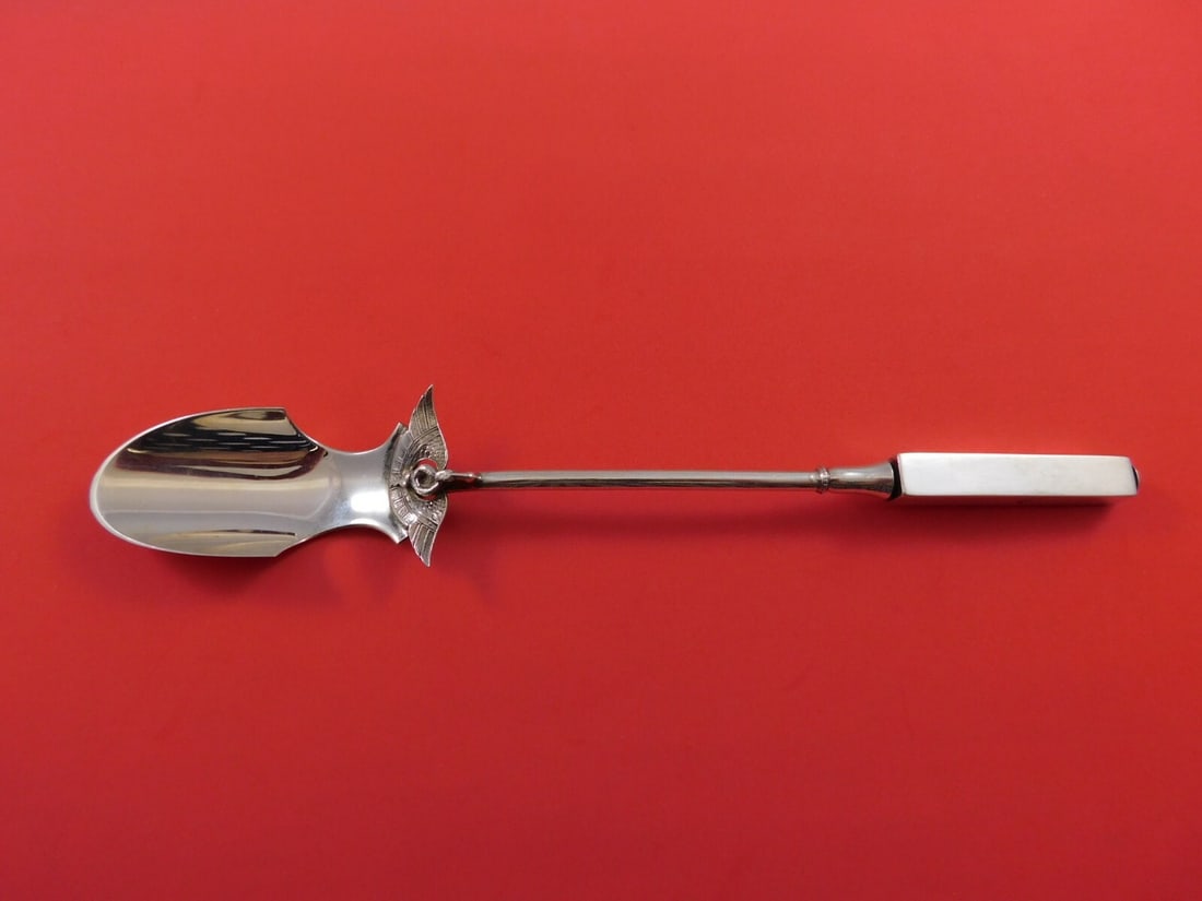 Gorham Isis Sterling Silver Cheese Scoop 9 3/8 Inch Serving Piece: Gorham Isis Sterling Silver Cheese Scoop 9 3/8 Inch Serving Piece Presenting the stunning Isis cheese scoop by Gorham, a remarkable piece from the Egyptian Revival era, crafted in sterling silver. Thi