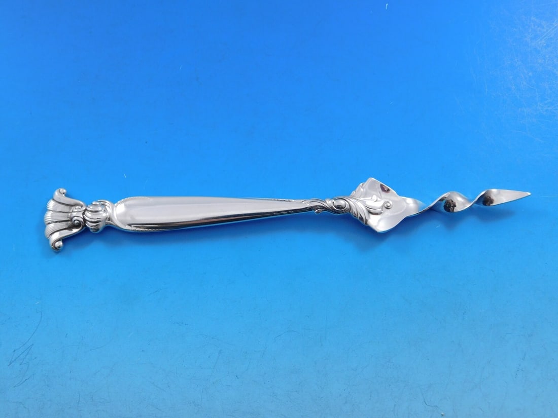 Wallace Romance of the Sea Sterling Silver Butter Pick Twisted 6.25 Inch: Wallace Romance of the Sea Sterling Silver Butter Pick Twisted 6.25 Inch This exquisite butter pick is a custom piece from the renowned Wallace collection, featuring the elegant "Romance of the Sea" p