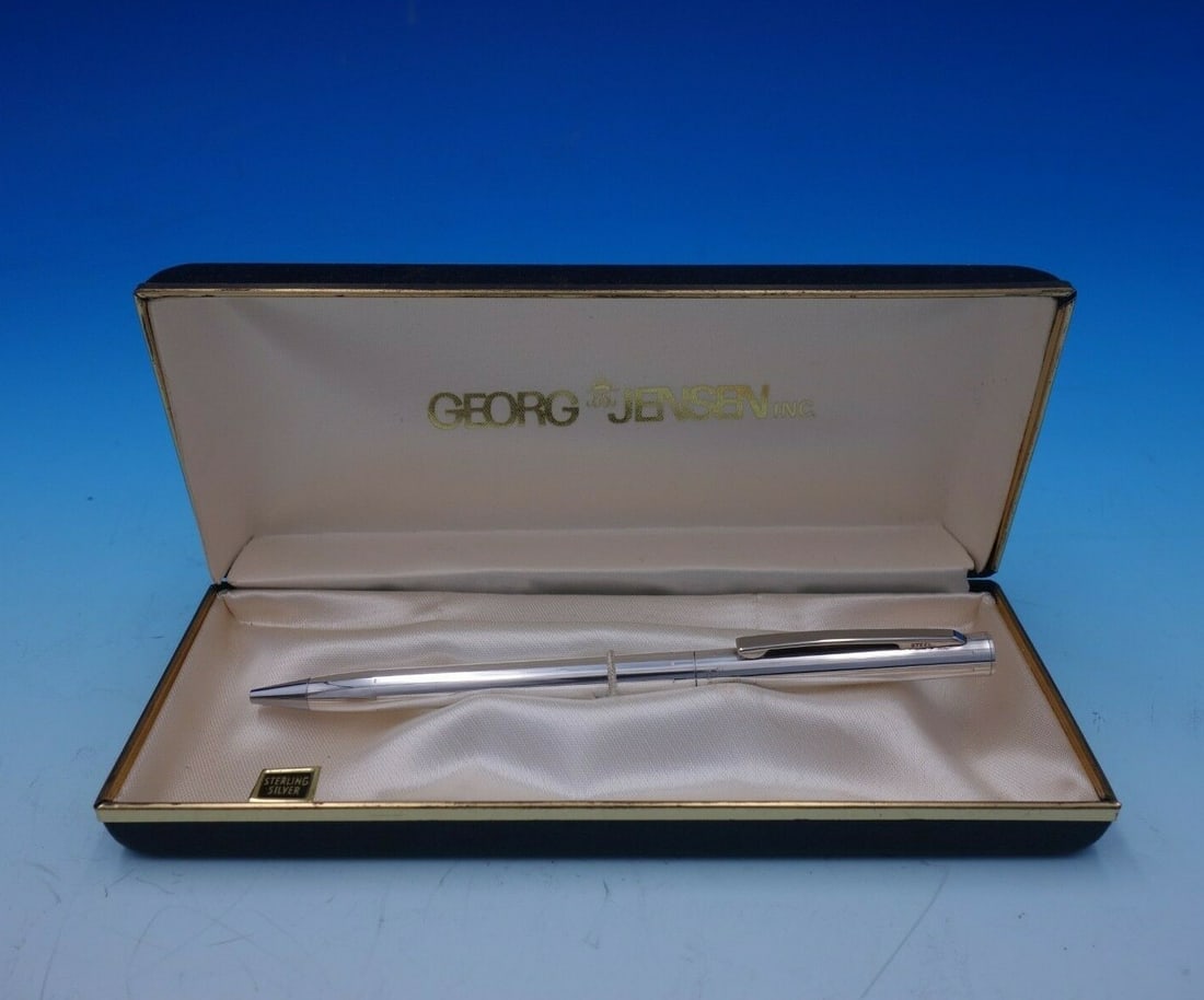 Georg Jensen Sterling Silver Pen 5 Inch in Fitted Box: Georg Jensen Sterling Silver Pen 5 Inch in Fitted Box This exquisite Georg Jensen pen is crafted from sterling silver and comes in a fitted box. Measuring 5 inches in length, this pen showcases the re