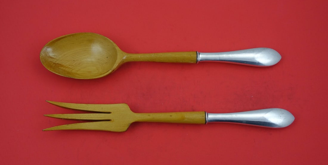 Frank Whiting Adams Sterling Silver Salad Serving Set with Wood 11 1/4": Frank Whiting Adams Sterling Silver Salad Serving Set with Wood 11 1/4" Elevate your dining experience with this exquisite Adams salad serving set by Frank Whiting, crafted from high-quality sterling