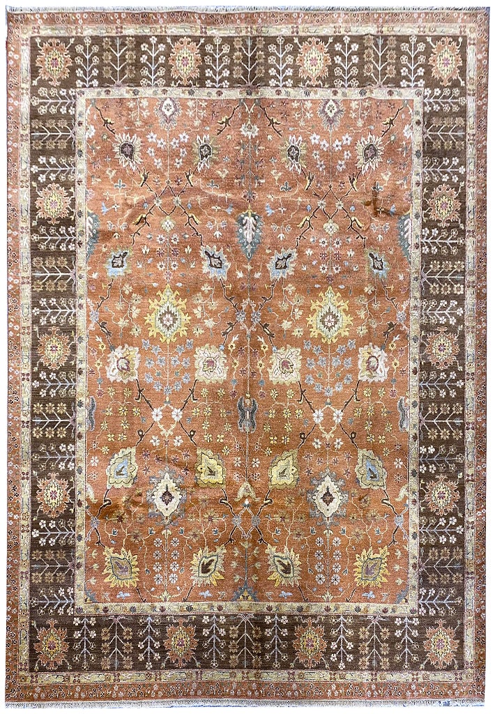 8.1 x 10 Wool Agra Rug Handcrafted in Rust Brown: 8.1 x 10 Wool Agra Rug Handcrafted in Rust Brown Free continental US Shipping Enhance your home decor with this exquisite 8' x 10' Wool Agra Rug, showcasing a beautiful rust and brown color palette. T