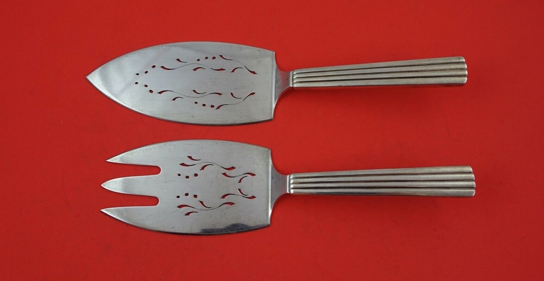 Georg Jensen Bernadotte Sterling Silver 2pc Fish Serving Set: Georg Jensen Bernadotte Sterling Silver 2pc Fish Serving Set Experience timeless elegance with the Bernadotte by Georg Jensen Sterling Silver Fish Serving Set. This exquisite 2-piece set, crafted from