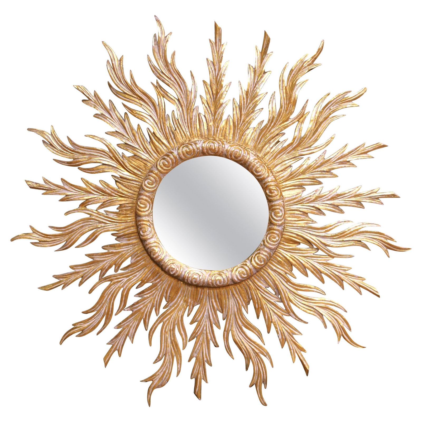 French Louis XIV Style Giltwood Sunburst Wall Mirror circa 1970: French Louis XIV Style Giltwood Sunburst Wall Mirror circa 1970 This mid-century French sunburst mirror features a hand-carved giltwood frame with dynamic, stylized rays in a flame-like form, inspired
