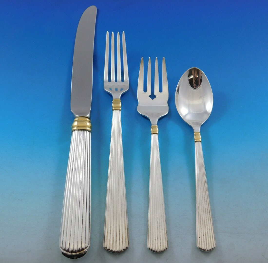 Reed & Barton Ashmont Gold Sterling Silver Flatware Set 36 pcs: Reed & Barton Ashmont Gold Sterling Silver Flatware Set 36 pcs Elevate your dining experience with the Ashmont Gold Sterling Silver Flatware Set by Reed & Barton. This exquisite 36-piece set features