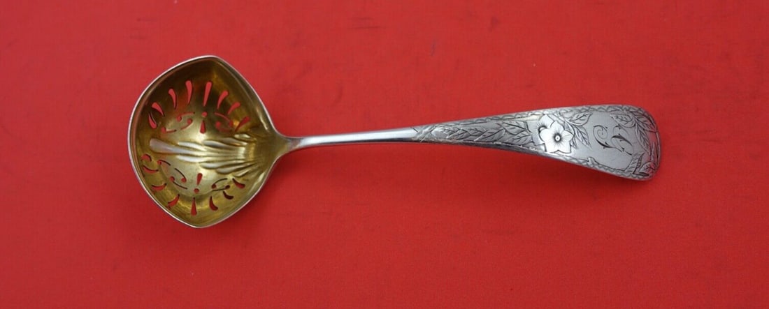 Gorham Clematis Sterling Silver Sugar Sifter Ladle 6 1/8" Monogrammed: Gorham Clematis Sterling Silver Sugar Sifter Ladle 6 1/8" Monogrammed This exquisite sugar sifter ladle from Gorham features the elegant Clematis pattern. Crafted from high-quality sterling silver, th