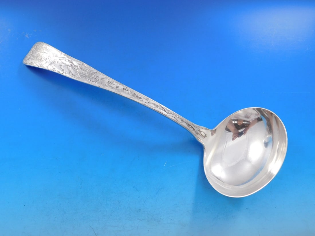 Tiffany Sterling Silver Oyster Ladle Lap Over Edge 11 1/4 Inches: Tiffany Sterling Silver Oyster Ladle Lap Over Edge 11 1/4 Inches This exquisite oyster ladle by Tiffany & Co. features the elegant Lap Over Edge pattern, showcasing an intricate acid-etched design wit