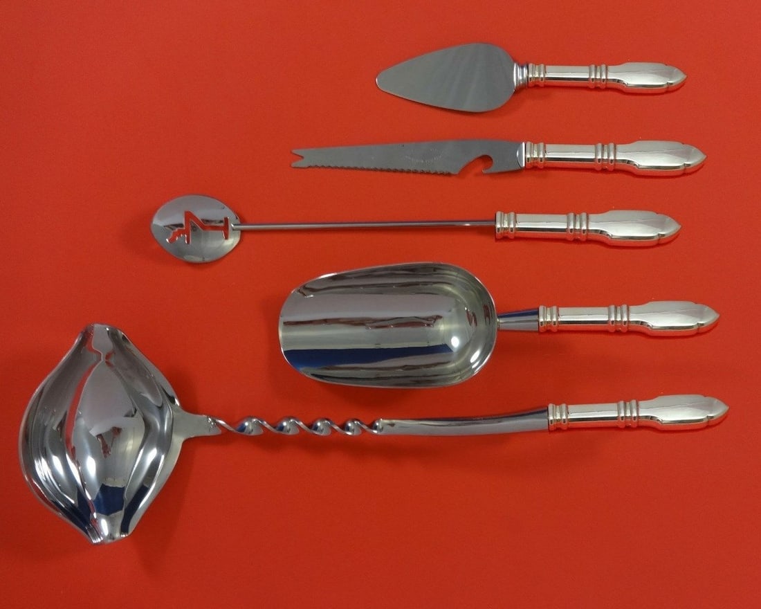 Graff W & D Sterling Silver 5pc Cocktail Bar Set: Graff W & D Sterling Silver 5pc Cocktail Bar Set Elevate your cocktail parties with this exquisite 5-piece custom bar serving set by Graff W & D. Crafted from high-quality sterling silver, this set fe