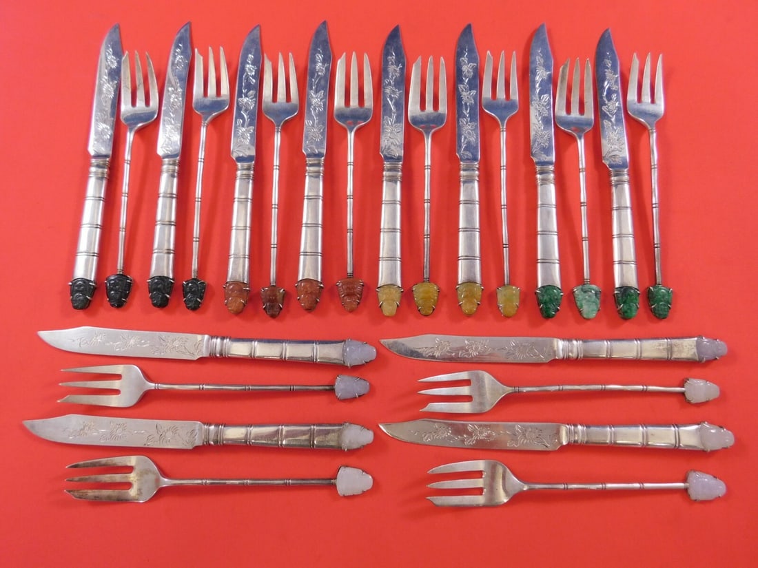 Lee Yee Hing 24pc Chinese Export .900 Silver Fruit Set with Carved Buddha Jades: Lee Yee Hing 24pc Chinese Export .900 Silver Fruit Set with Carved Buddha Jades Discover the exquisite craftsmanship of this Lee Yee Hing Chinese Export .900 Silver Fruit Set. This remarkable 24-piece