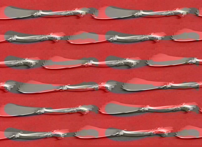 Wallace Waltz of Spring 12 Piece Sterling Silver Butter Spreader Set: Wallace Waltz of Spring 12 Piece Sterling Silver Butter Spreader Set Enhance your dining experience with this exquisite 12-piece butter spreader set from Wallace, featuring the elegant "Waltz of Sprin