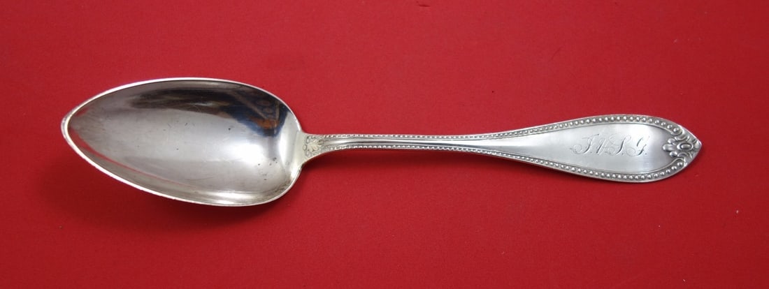 Vanderslice Beaded Sterling Silver Serving Spoon 8 5/8" Antique: Vanderslice Beaded Sterling Silver Serving Spoon 8 5/8" Antique This exquisite serving spoon, crafted by Vanderslice, showcases a classic beaded pattern. Made of high-quality sterling silver, it dates