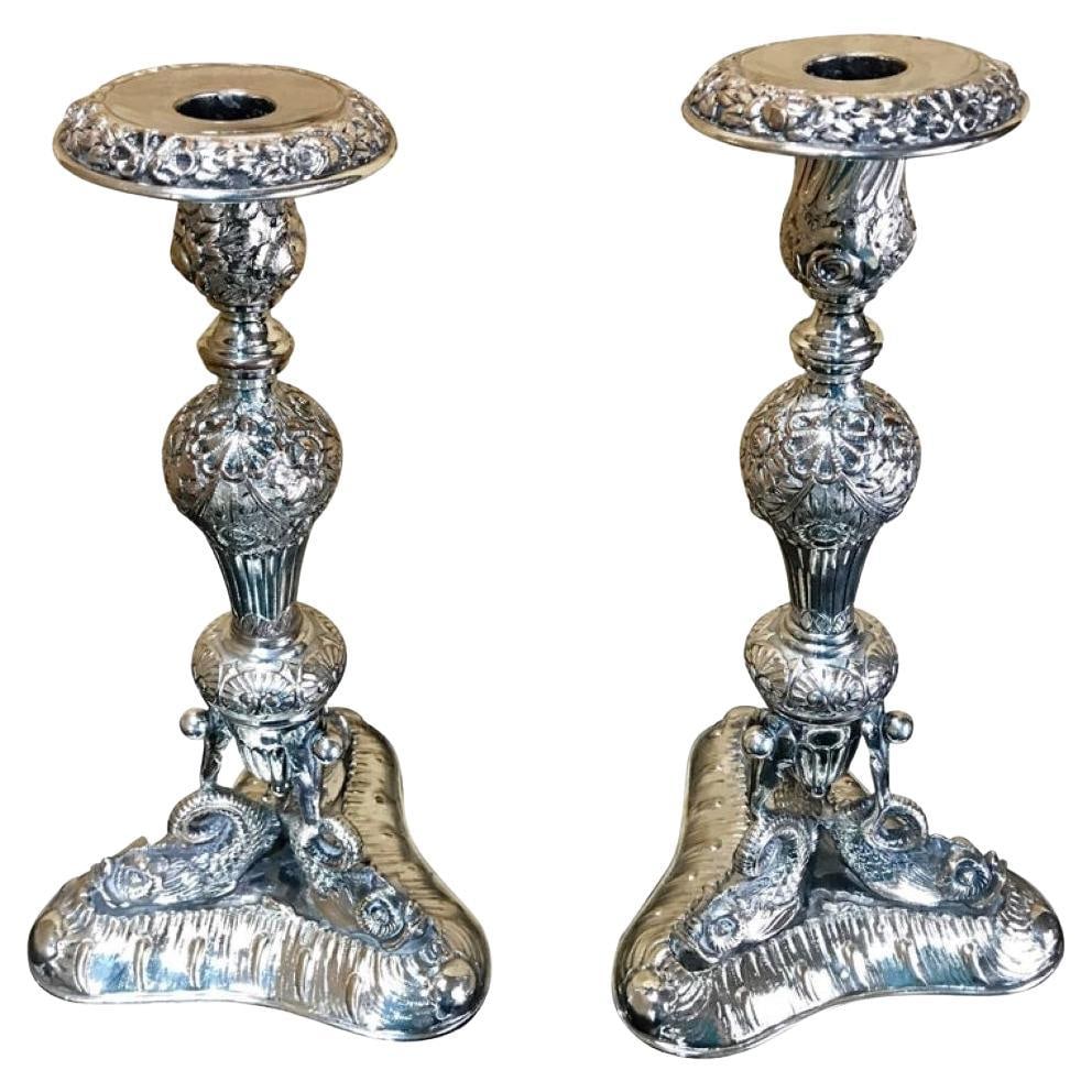 Antique 19th Century Sheffield Plate Dolphin Candlesticks Set of 2: Antique 19th Century Sheffield Plate Dolphin Candlesticks Set of 2 This pair of elegant antique Sheffield Plate neoclassical candlesticks, crafted in England during the 19th century, stands at a heigh