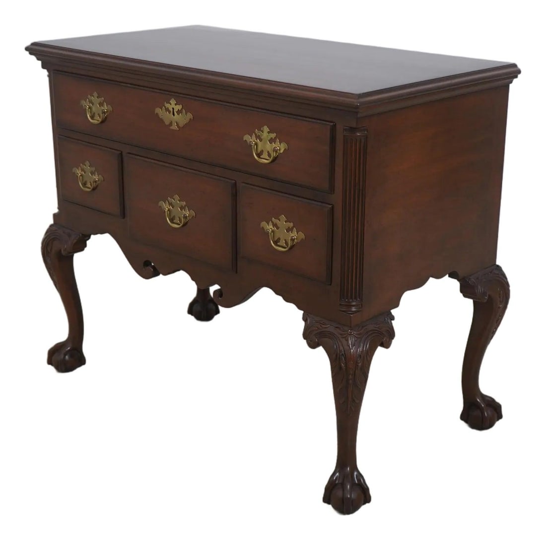 Kittinger Colonial Williamsburg Mahogany Chippendale Lowboy with Ball Claw Feet: Kittinger Colonial Williamsburg Mahogany Chippendale Lowboy with Ball Claw Feet This exquisite Kittinger Colonial Williamsburg Mahogany Chippendale Lowboy showcases a timeless design that reflects the