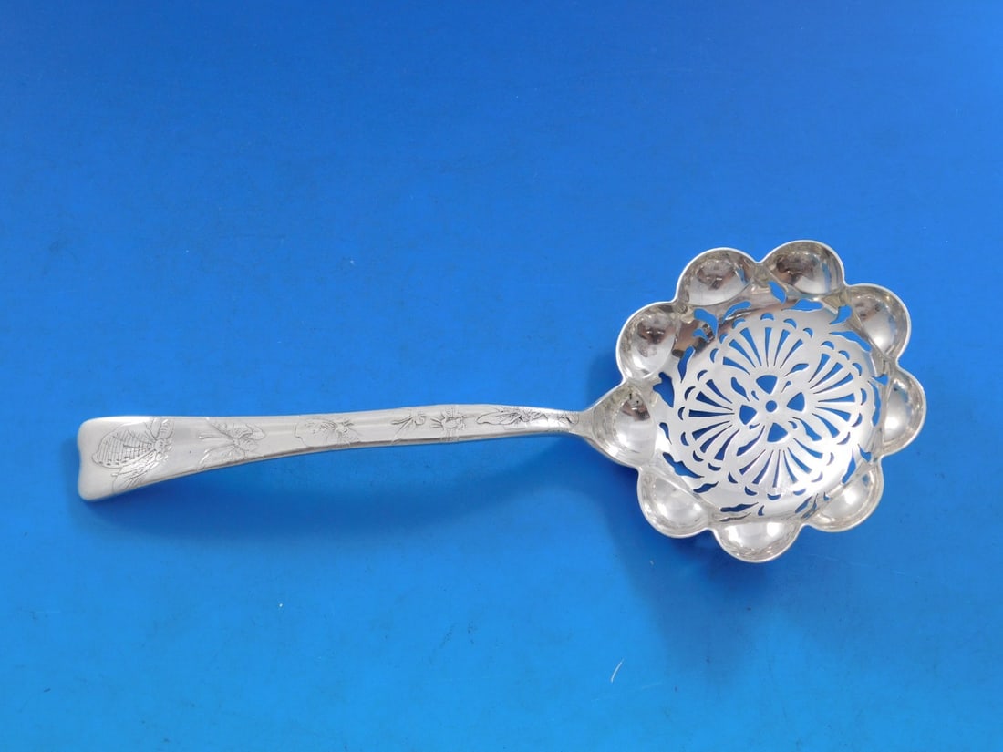 Tiffany Sterling Silver Lap Over Edge Sugar Sifter with Dragonfly Butterfly: Tiffany Sterling Silver Lap Over Edge Sugar Sifter with Dragonfly Butterfly This exquisite sugar sifter, crafted by Tiffany & Co., features a stunning Lap Over Edge design with intricate acid-etched d