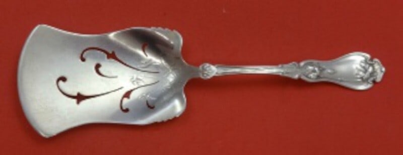 Frank M. Whiting Violet Sterling Silver Croquette Server 7.25in: Frank M. Whiting Violet Sterling Silver Croquette Server 7.25in This exquisite croquette server is crafted from sterling silver and features the elegant Violet pattern by Frank M. Whiting. Measuring 7