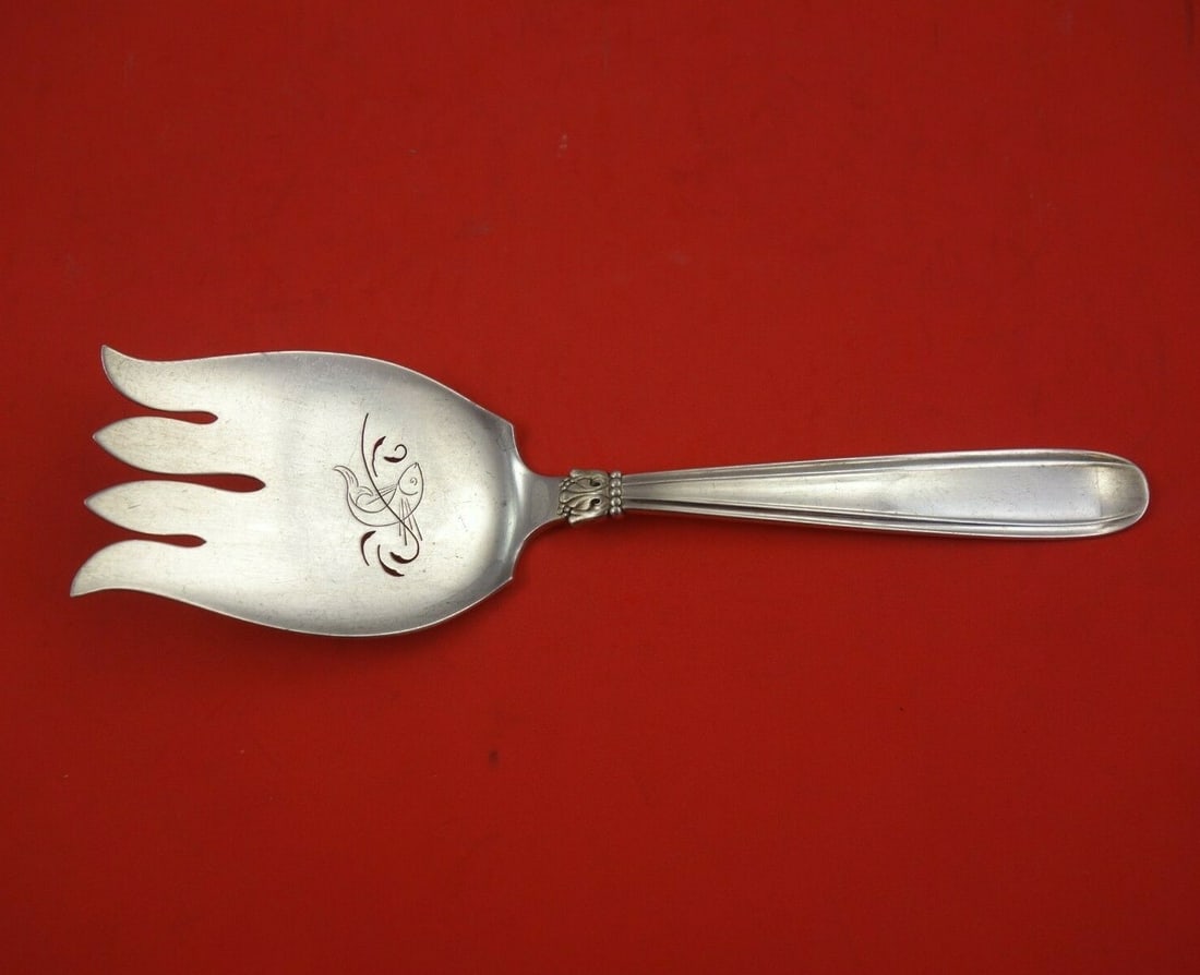 W & S Sorensen Karina Sterling Silver Fish Serving Fork 8 1/8": W & S Sorensen Karina Sterling Silver Fish Serving Fork 8 1/8" This exquisite serving fork from the Karina pattern by W & S Sorensen is crafted from sterling silver, showcasing a beautifully pierced d