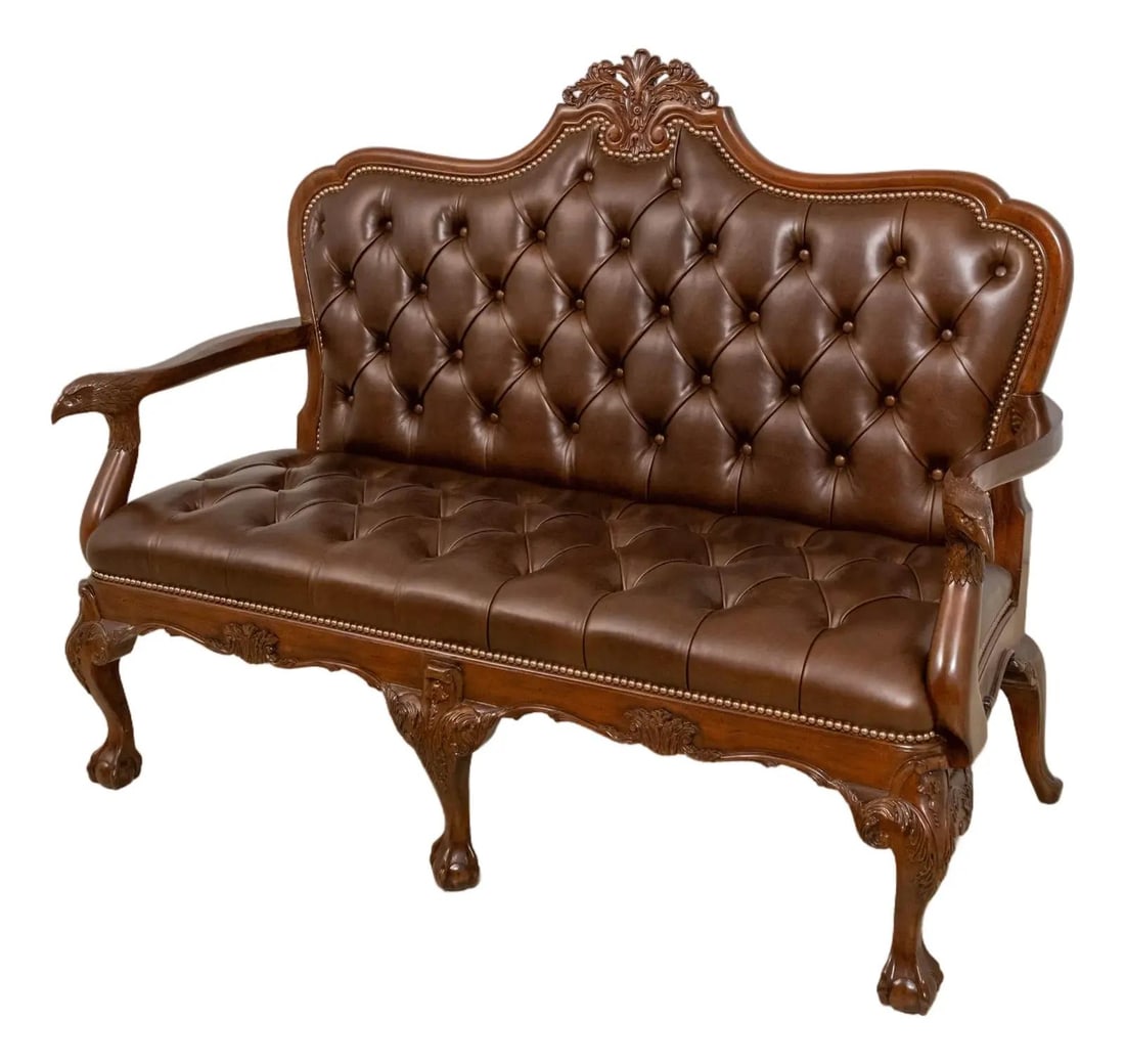 Scarborough House Georgian Style Mahogany Tufted Leather Settee: Scarborough House Georgian Style Mahogany Tufted Leather Settee This exquisite Georgian-style settee showcases a stunning mahogany frame adorned with fine carved details and elegant ball & claw feet.