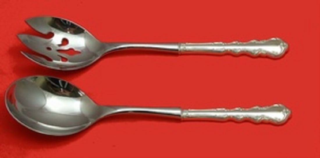 Angelique International Sterling Silver Salad Serving Set 2pc 10 1/2in: Angelique International Sterling Silver Salad Serving Set 2pc 10 1/2in Introducing the exquisite Angelique Salad Serving Set by International Sterling, crafted from high-quality sterling silver with h