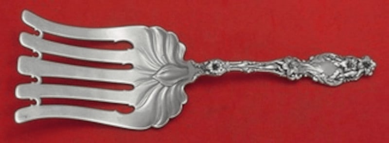 Whiting Lily Sterling Silver Asparagus Fork 10 1/8 Inch Serving Fork: Whiting Lily Sterling Silver Asparagus Fork 10 1/8 Inch Serving Fork This exquisite asparagus fork from the Lily pattern by Whiting is crafted from high-quality sterling silver (.925). Measuring 10 1/