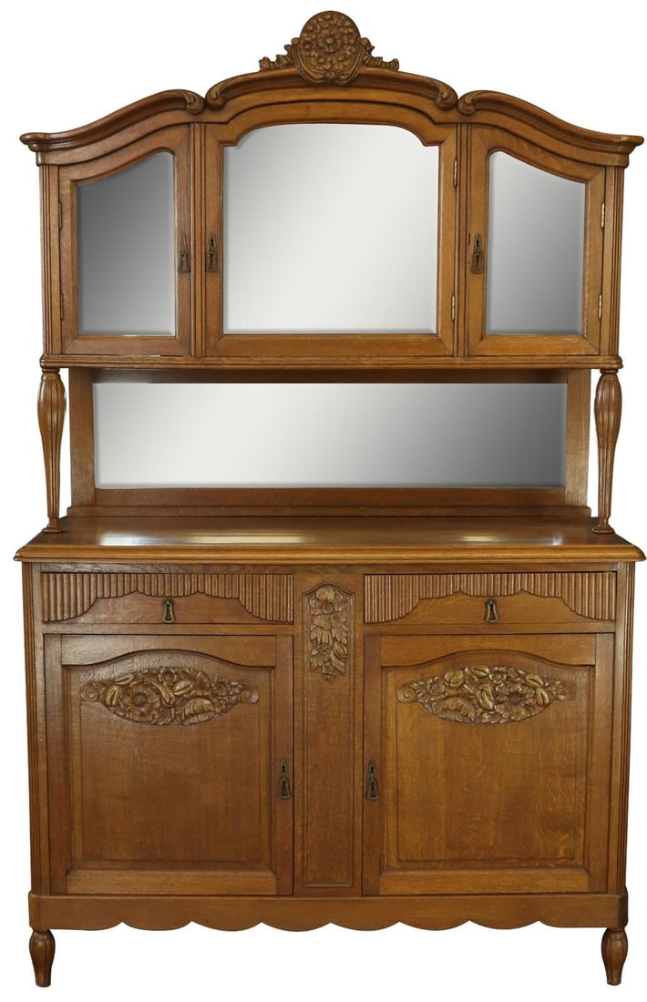 French Art Deco Buffet 1920 Oak Chestnut Floral Carvings: French Art Deco Buffet 1920 Oak Chestnut Floral Carvings This exquisite French Art Deco buffet, crafted from oak and finished in a rich chestnut hue, dates back to 1920. Showcasing intricate floral ca