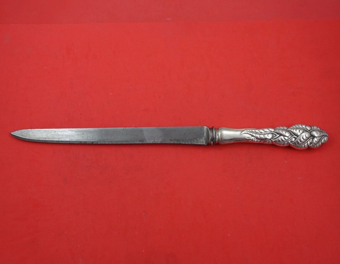 Tiffany & Co Ailanthus Sterling Silver Roast Carving Knife 14 inch: Tiffany & Co Ailanthus Sterling Silver Roast Carving Knife 14 inch Presenting the Ailanthus Roast Carving Knife, a fine piece from Tiffany & Co. This exquisite knife features a sterling silver hollow