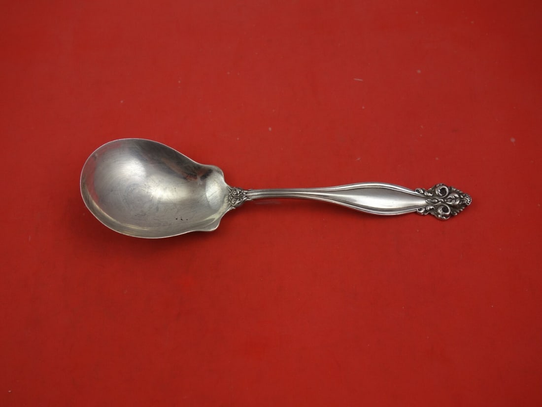 International Silver Jeanne D'Arc Vintage 8 3/4 Inch Berry Spoon: International Silver Jeanne D'Arc Vintage 8 3/4 Inch Berry Spoon This exquisite berry spoon is part of the renowned Jeanne D'Arc pattern by International Sterling. Crafted from high-quality sterling s