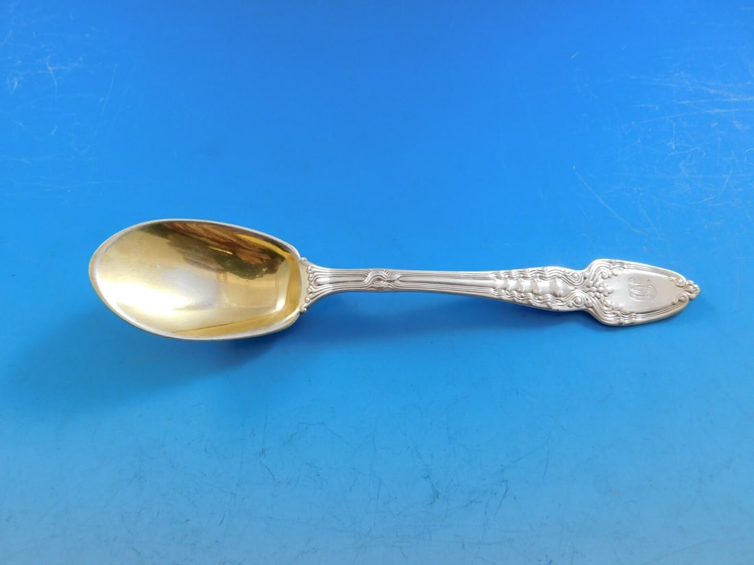 Tiffany & Co. Broom Corn Sterling Silver Ice Cream Spoon Gold Wash 5 3/4": Tiffany & Co. Broom Corn Sterling Silver Ice Cream Spoon Gold Wash 5 3/4" Indulge in a touch of elegance with this Tiffany & Co. ice cream spoon from the Broom Corn pattern. Crafted from high-quality