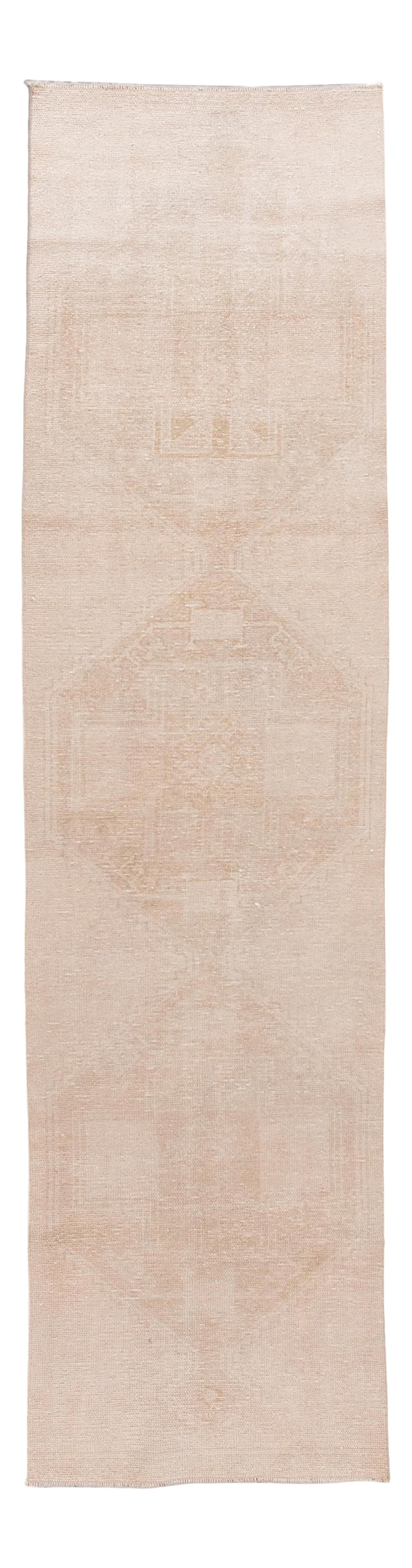 1960s Vintage Turkish Handmade Wool Runner 3' x 12' Beige Tribal Design: 1960s Vintage Turkish Handmade Wool Runner 3' x 12' Beige Tribal Design Discover the charm of this vintage Turkish hand-knotted wool runner, featuring a warm beige field adorned with elegant tan accen