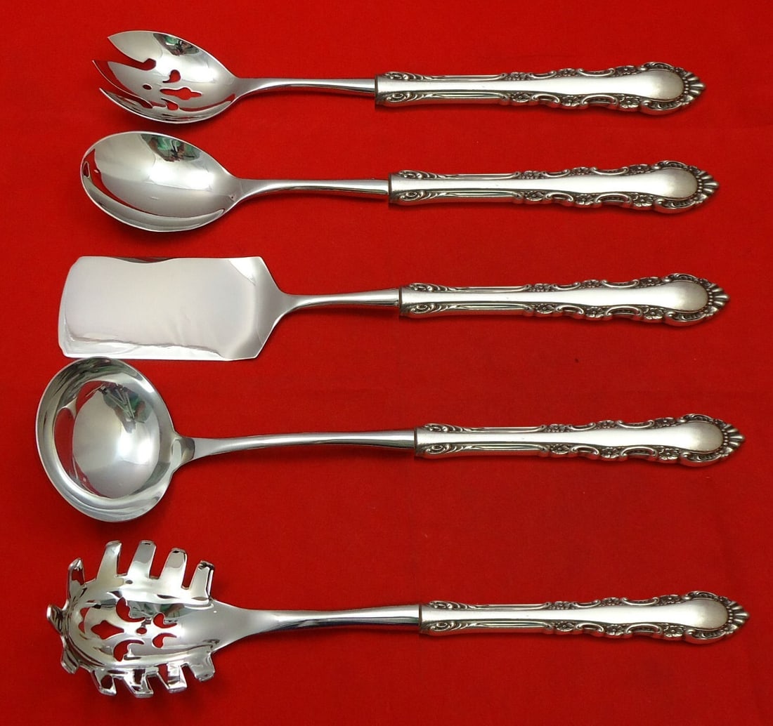 Reed and Barton Georgian Rose Sterling Silver 5pc Hostess Set: Reed and Barton Georgian Rose Sterling Silver 5pc Hostess Set Elevate your dining experience with the Georgian Rose Hostess Set by Reed and Barton. This exquisite 5-piece serving set is crafted from s