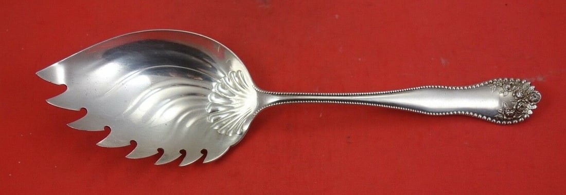 Gorham Lancaster Sterling Silver Oyster Server 9 3/4": Gorham Lancaster Sterling Silver Oyster Server 9 3/4" Enhance your dining experience with this exquisite Lancaster by Gorham Sterling Silver Oyster Server, measuring 9 3/4". Crafted by the renowned Go