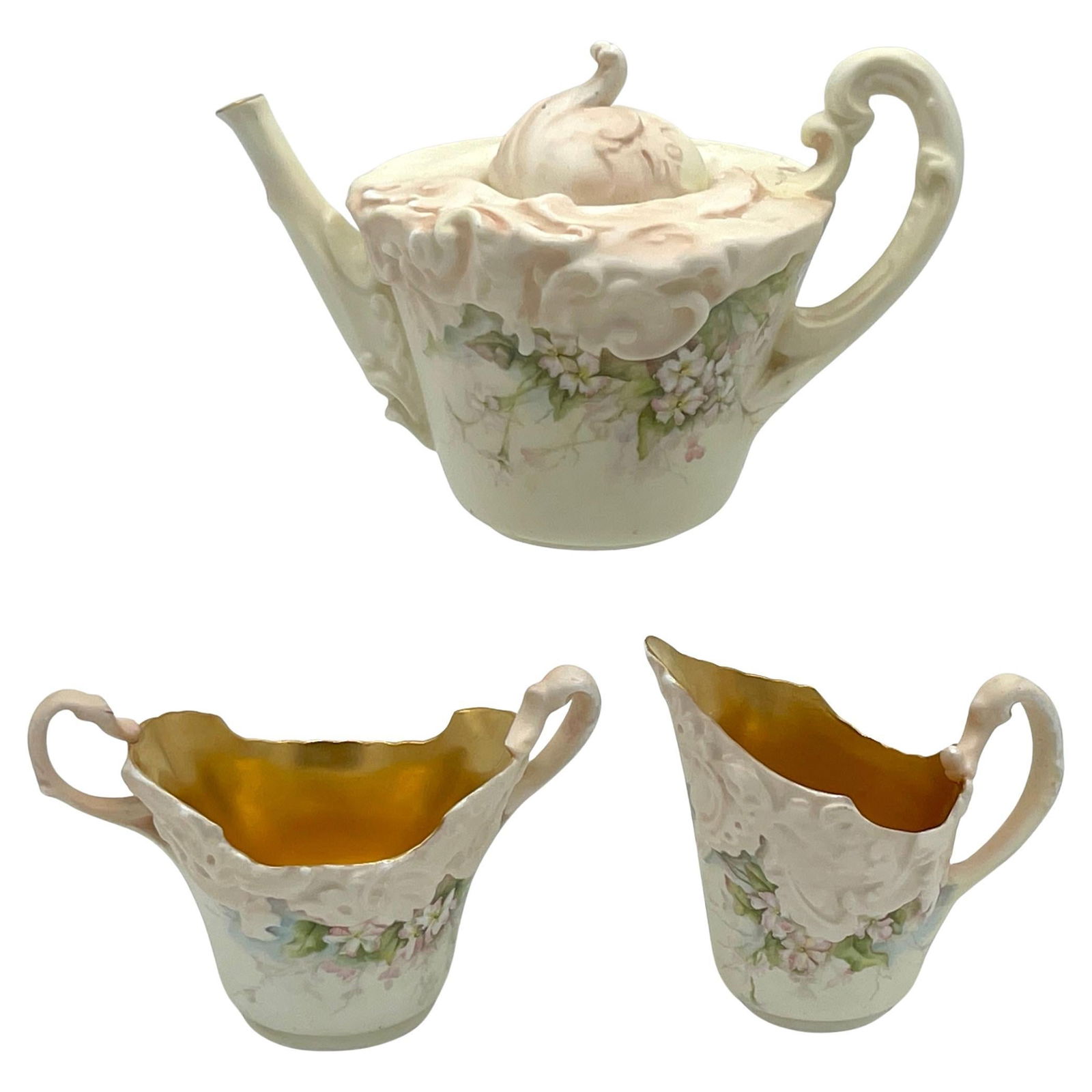 Doulton Burslem 1889 Blush Ivory 3 Piece Tea Set Apple Blossom Design: Doulton Burslem 1889 Blush Ivory 3 Piece Tea Set Apple Blossom Design This exquisite Doulton Burslem Blush Ivory three-piece tea set, crafted in 1889, embodies the elegance of the High Victorian style