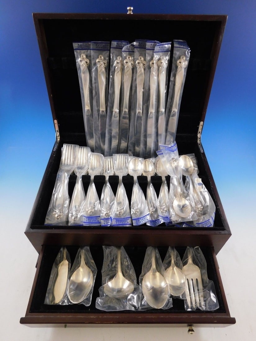 Wallace Orchid Elegance Sterling Silver Flatware Set 46 Pieces New: Wallace Orchid Elegance Sterling Silver Flatware Set 46 Pieces New Experience the sophistication of the Orchid Elegance flatware set by Wallace, crafted from premium sterling silver. This exquisite 46