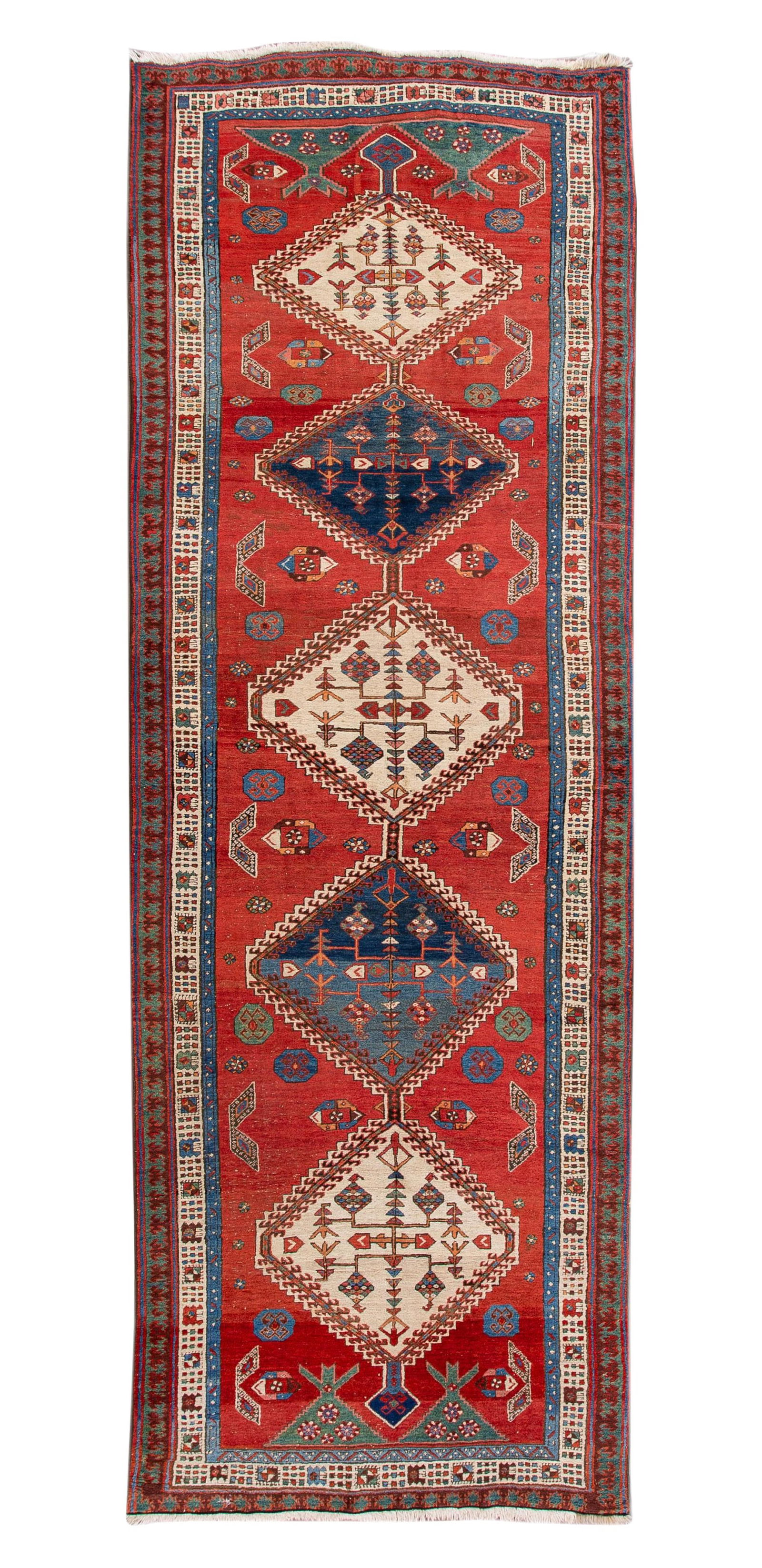 1920s Antique Serapi Wool Runner Red Tribal Design 5'3 x 15'6: 1920s Antique Serapi Wool Runner Red Tribal Design 5'3 x 15'6 Discover the exquisite craftsmanship of this antique Serapi hand-knotted wool runner, featuring a stunning rust field. The design showcase