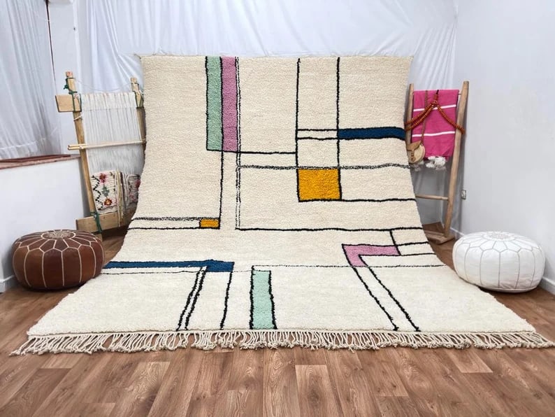 Authentic Handmade Wool Rug 9 x 5 Feet from Morocco: Authentic Handmade Wool Rug 9 x 5 Feet from Morocco Experience the exquisite craftsmanship of this Luxury Soft Handmade Wool Rug, meticulously handwoven in the Atlas Mountains by skilled Berber women