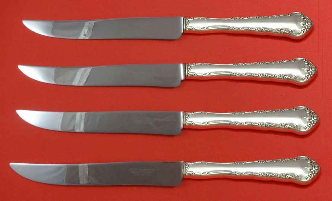 Towle Peachtree Manor Sterling Silver Steak Knife Set 4pc Texas Sized: Towle Peachtree Manor Sterling Silver Steak Knife Set 4pc Texas Sized Enhance your dining experience with this exquisite 4-piece steak knife set from the Peachtree Manor collection by Towle. Crafted f
