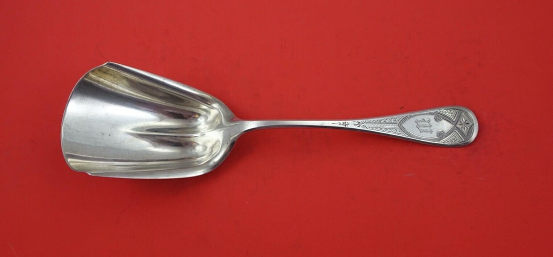 Tiffany & Co King William Engraved Sterling Silver Cracker Scoop 9 1/4 Inch: Tiffany & Co King William Engraved Sterling Silver Cracker Scoop 9 1/4 Inch This exquisite serving spoon, a sterling silver cracker scoop, is part of the renowned King William Engraved pattern by Tiff