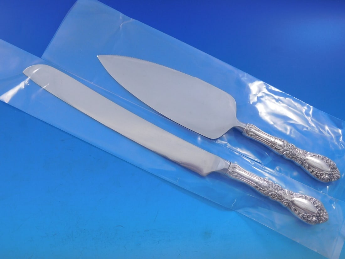 Alvin Prince Eugene Sterling Silver Wedding Cake Set 2pc: Alvin Prince Eugene Sterling Silver Wedding Cake Set 2pc Celebrate your special day with this exquisite Prince Eugene wedding cake set by Alvin. Crafted from high-quality sterling silver, this custom-