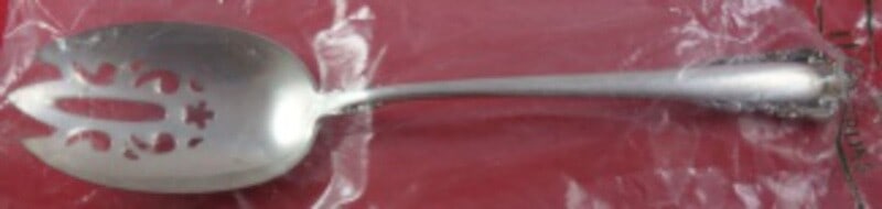 Lunt Carillon Sterling Silver Slotted Serving Spoon 8 1/4" Factory Sealed: Lunt Carillon Sterling Silver Slotted Serving Spoon 8 1/4" Factory Sealed Introducing the Carillon by Lunt Sterling Silver Serving Spoon, an elegant addition to your dining collection. This slotted sp