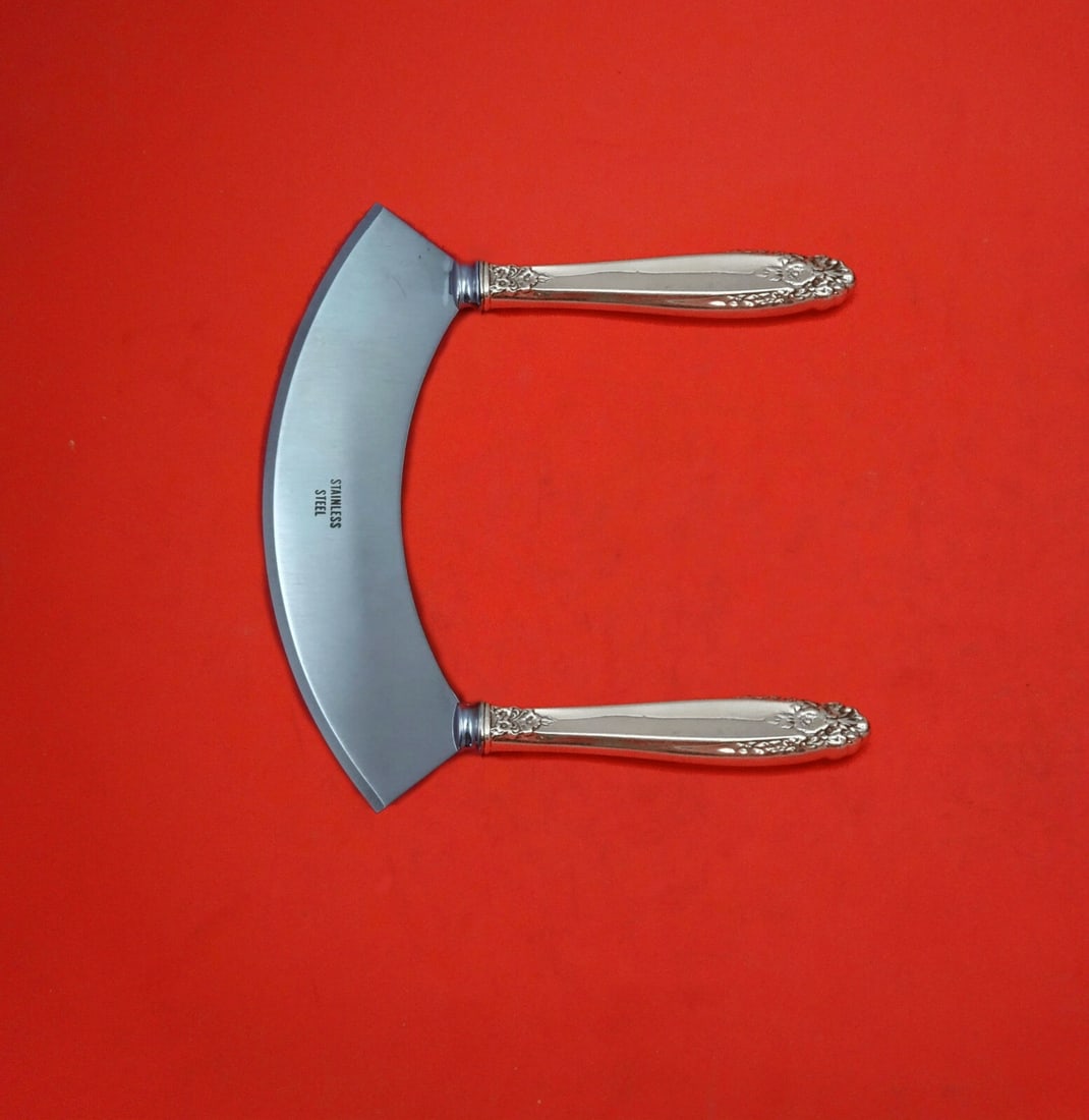 International Prelude Sterling Silver Mezzaluna Knife Custom Made 6 1/4": International Prelude Sterling Silver Mezzaluna Knife Custom Made 6 1/4" Introducing the Prelude Mezzaluna Knife, a beautifully crafted kitchen tool by International Sterling. This custom-made knife f