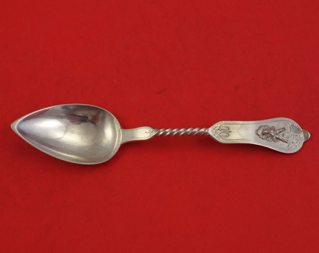 Duhme Saxon Stag Coin Silver Teaspoon Twisted Handle 6 3/8": Duhme Saxon Stag Coin Silver Teaspoon Twisted Handle 6 3/8" This exquisite Saxon Stag teaspoon by Duhme showcases a beautiful twisted handle and a pointed bowl, measuring 6 3/8" in length. The handle