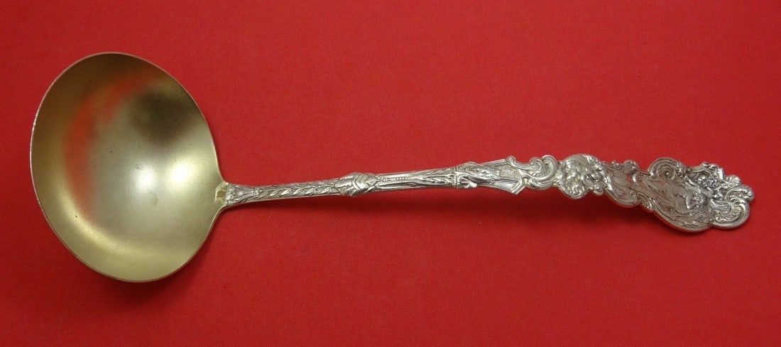 Gorham Versailles Sterling Silver Gold Washed Soup Ladle 12 3/4": Gorham Versailles Sterling Silver Gold Washed Soup Ladle 12 3/4" This exquisite soup ladle is crafted in sterling silver by Gorham and features a stunning gold wash finish. Measuring 12 3/4 inches, it