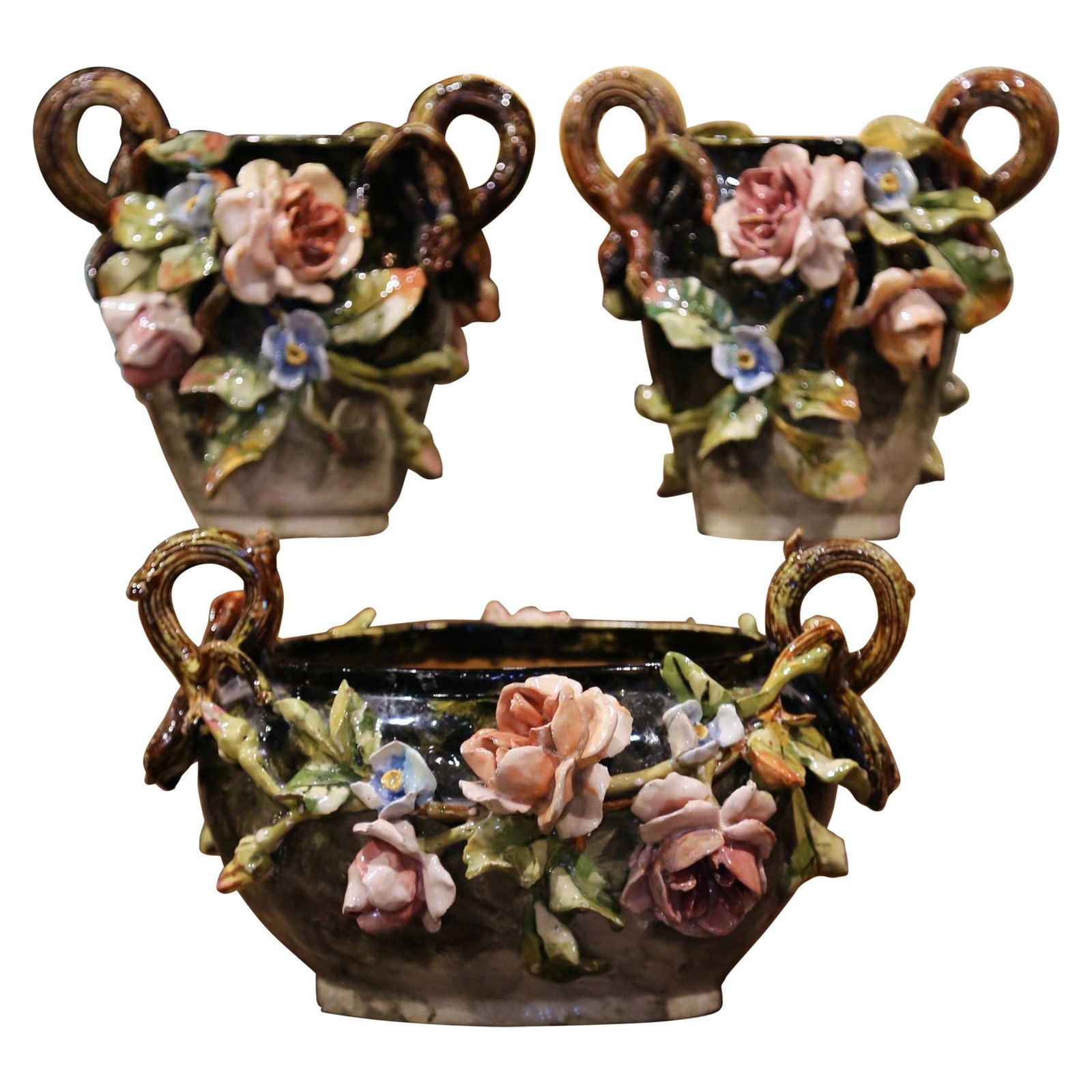 19th Century French Majolica Floral Vases and Jardiniere Set of 3: 19th Century French Majolica Floral Vases and Jardiniere Set of 3 Enhance your home decor with this exquisite set of 19th-century French Majolica floral vases and jardiniere, hailing from Montigny-sur